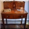 F36. Federal style flame mahogany desk with inlay. 